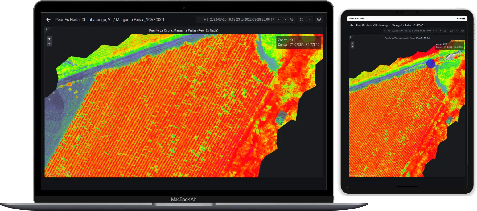 Mapa NDVI de un huerto en notebook y tablet, con zonas de vigor en verde, amarillo y rojo